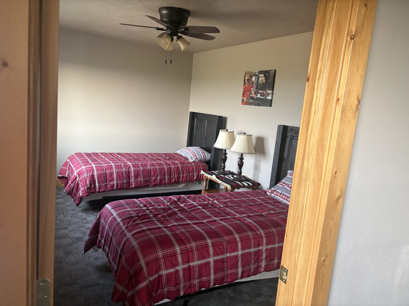 A bunkhouse bedroom with two beds at Bolton Ranch