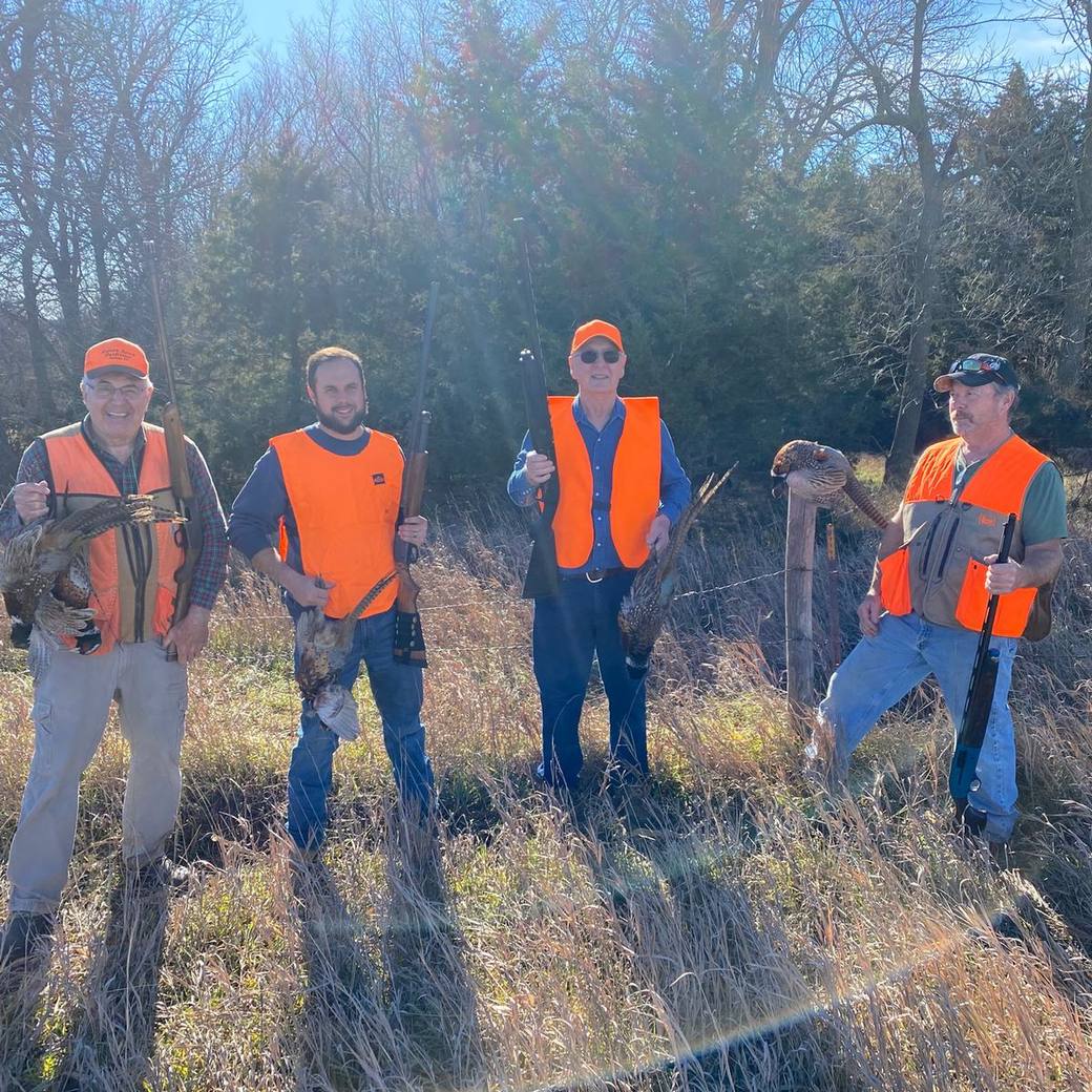 A group of hunters in blaze orange at Bolton Ranch