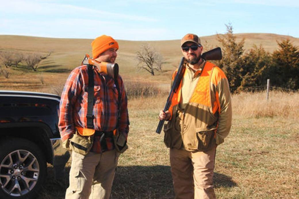 Pheasant hunters between fields at Bolton Ranch