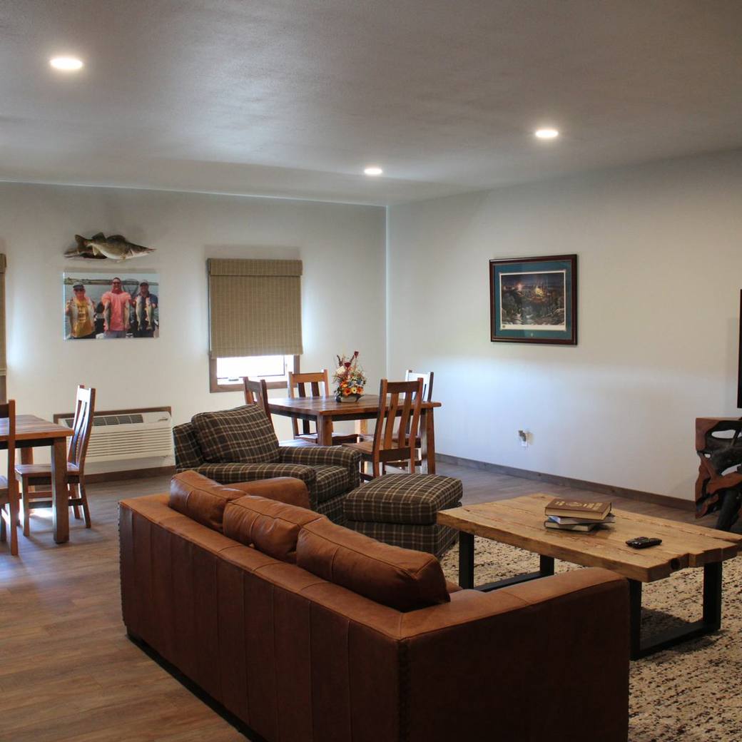 Lounge seating and big screen at the lodge