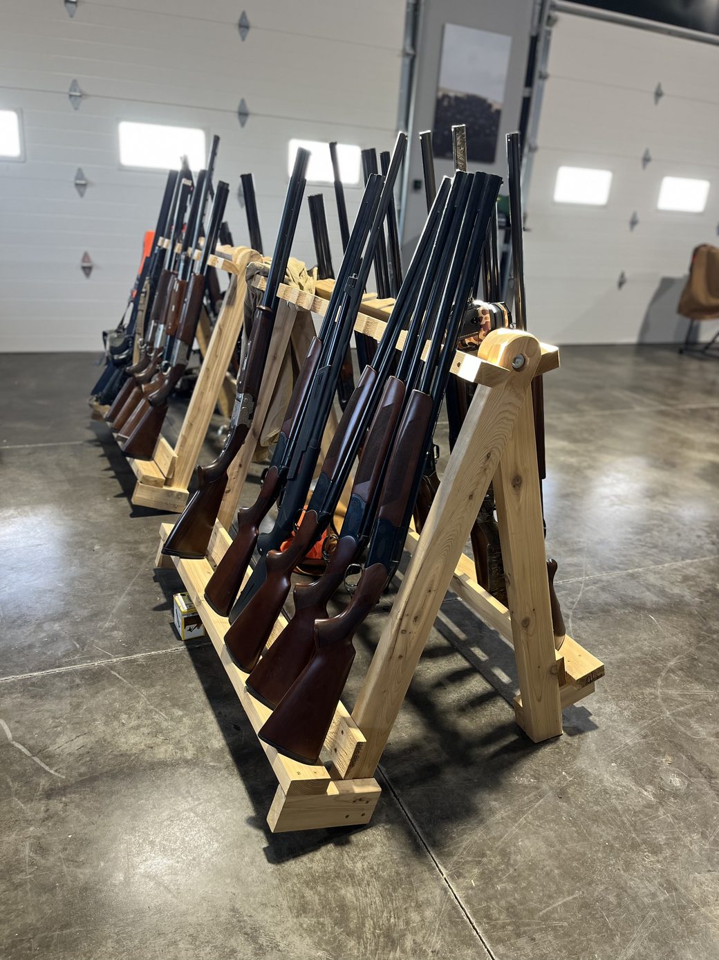 Guns racked indoors at The Range