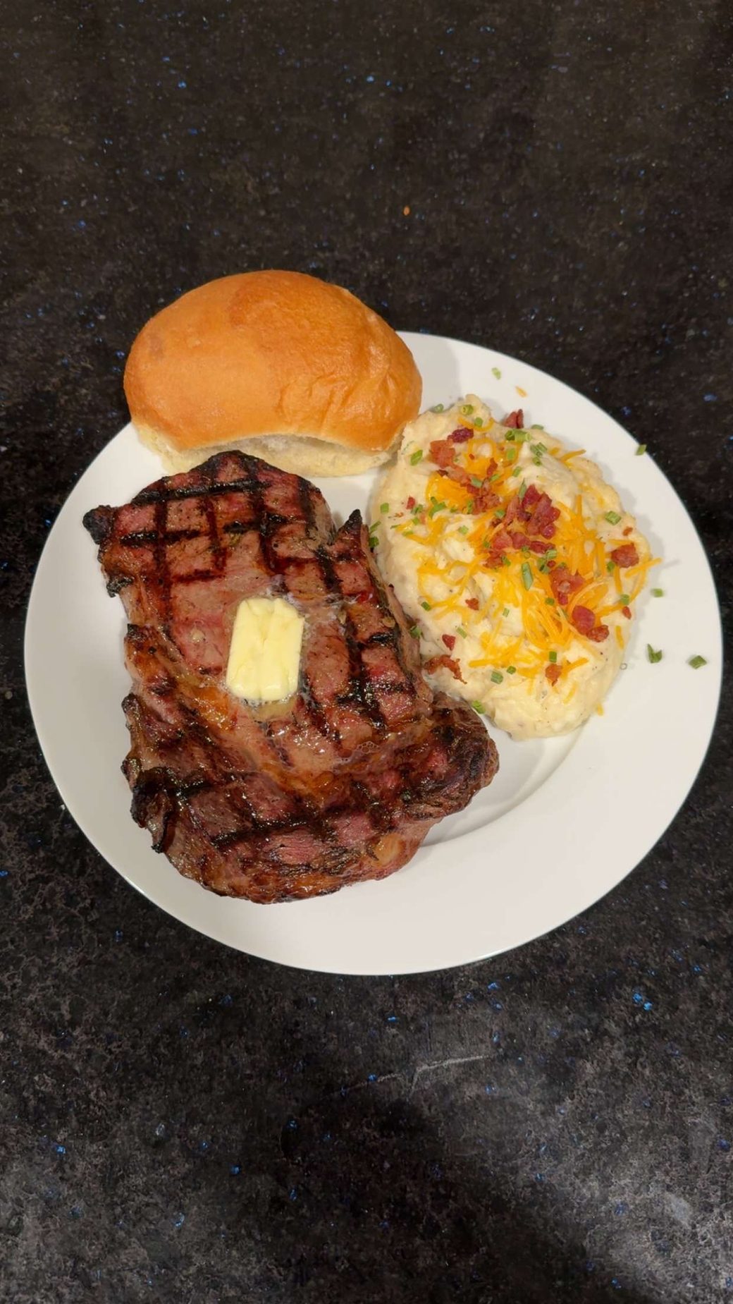A plated steak supper at the lodge
